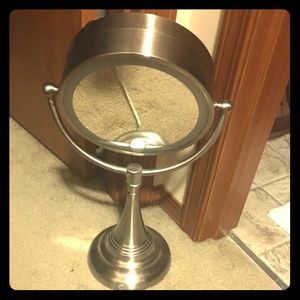 Double sided lighted makeup mirror